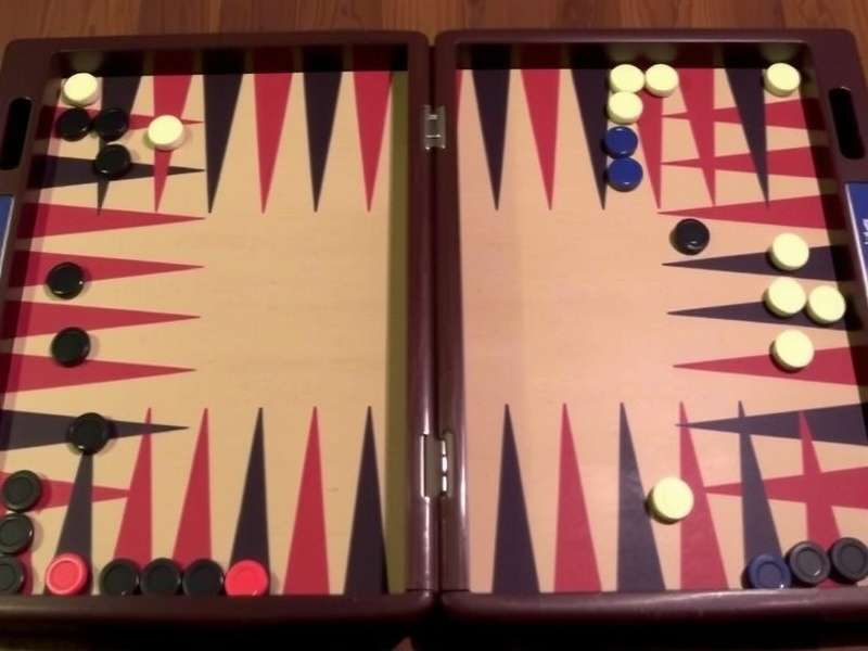 Professional Backgammon board setup with pieces and doubling cube